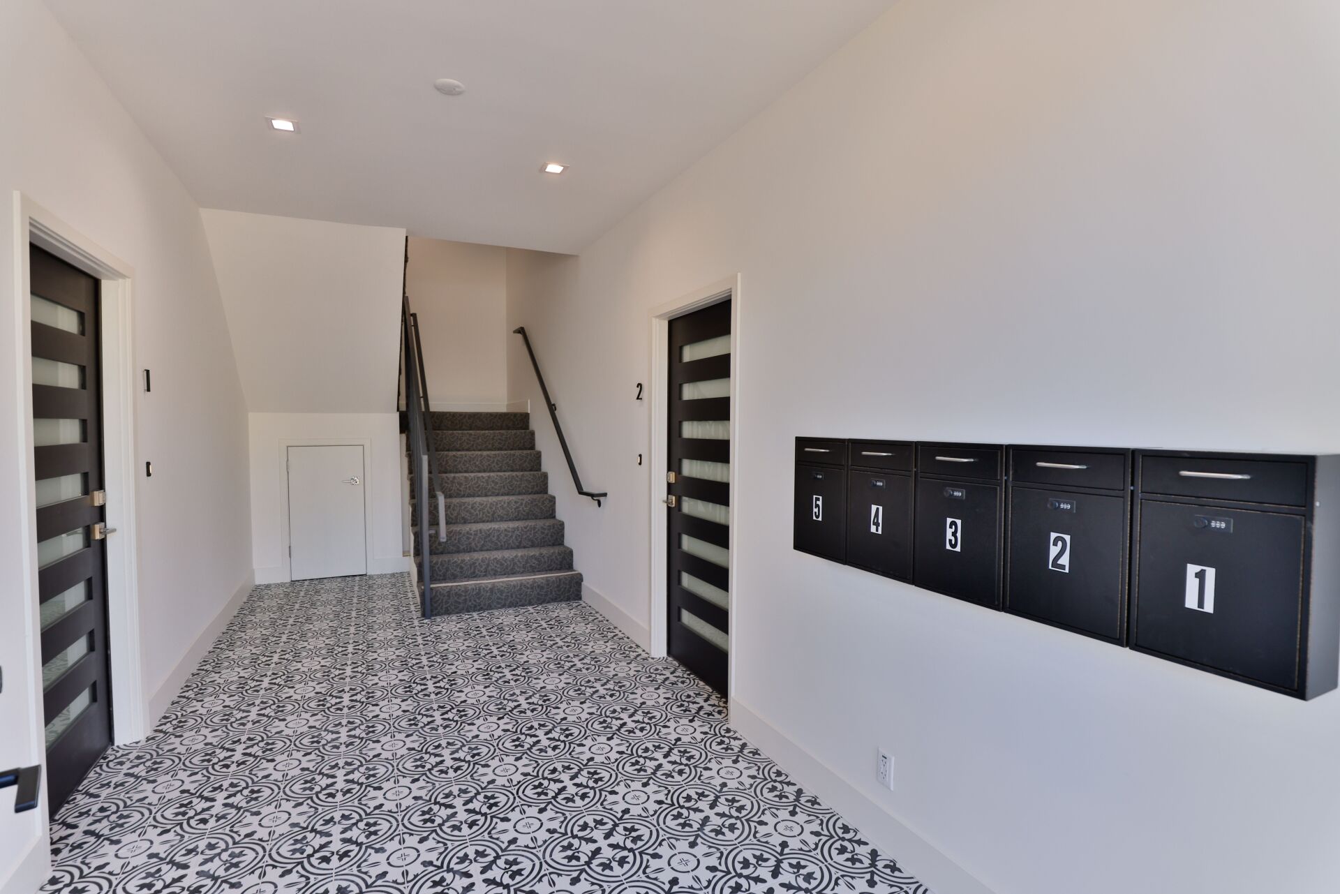 this image shows stairs and one door with brown and white background.