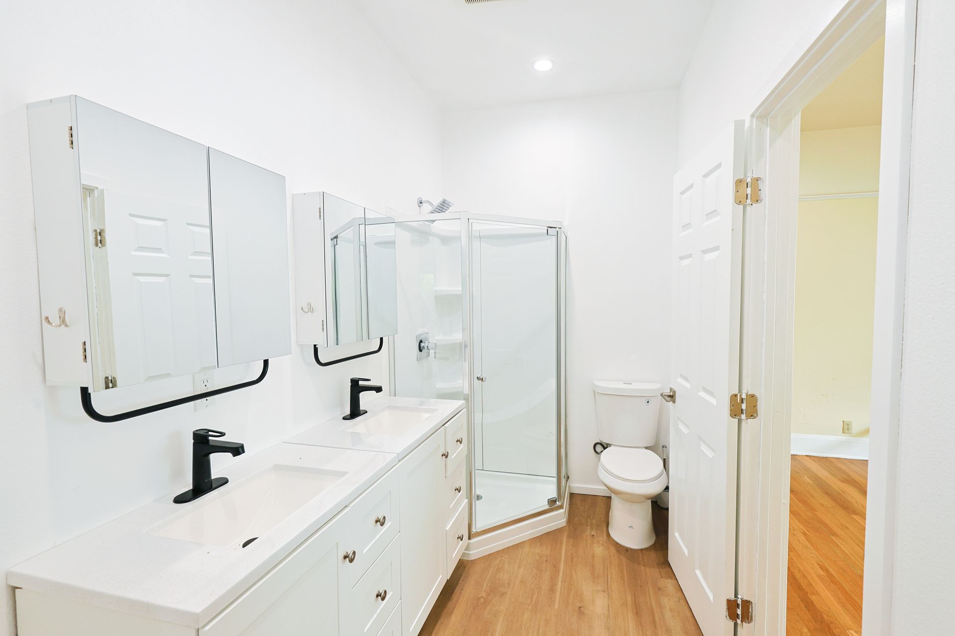 This image showing a beautiful luxury bathroom in a white colour.