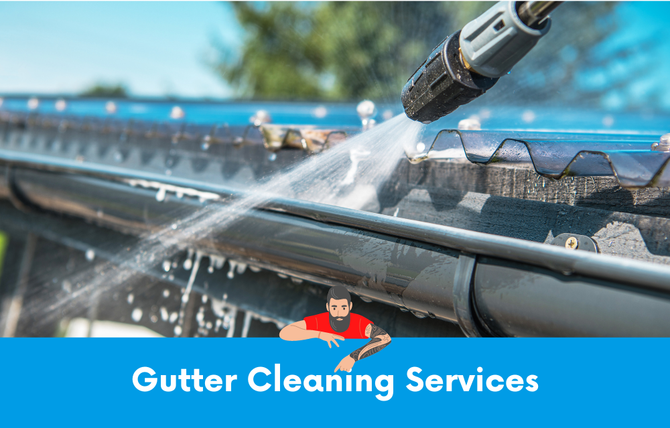 A man is cleaning a gutter with a high pressure washer.