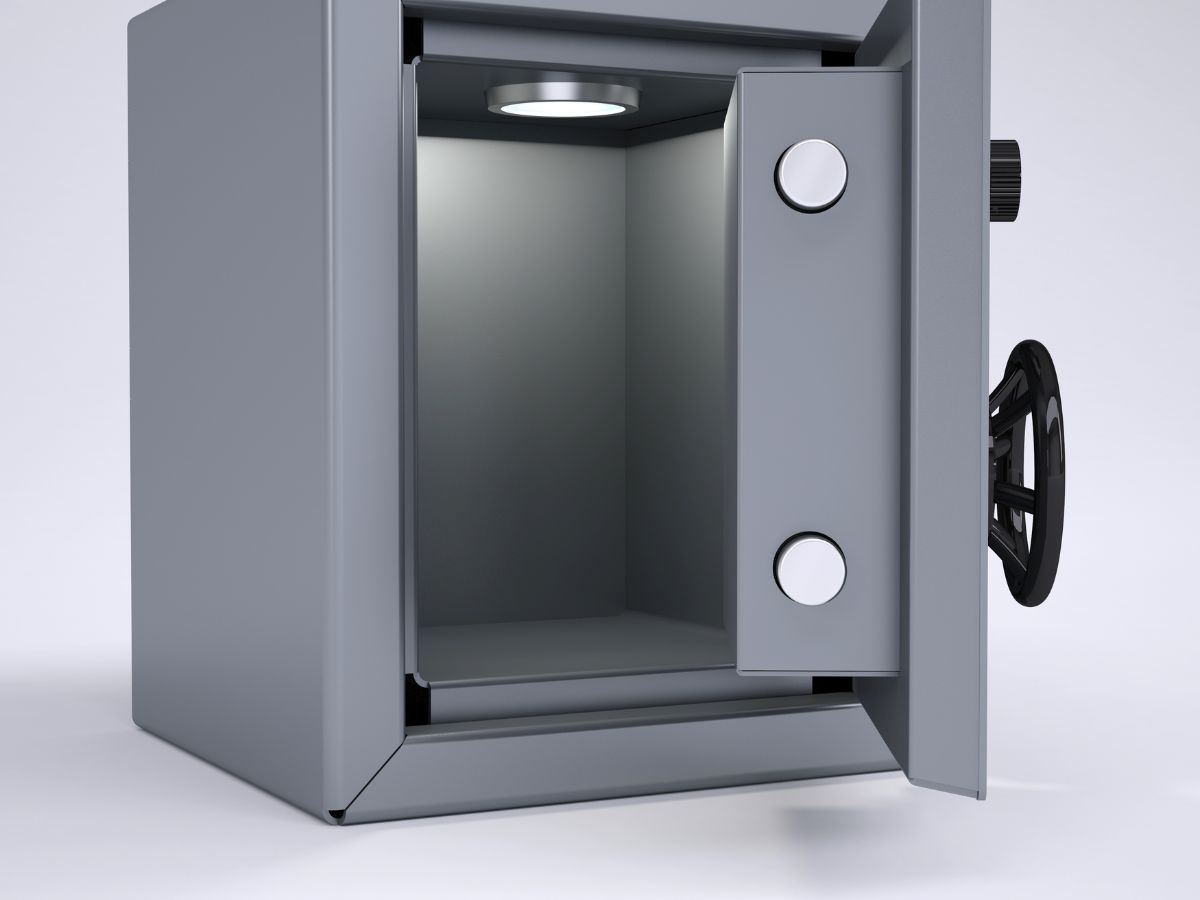 A group of people are dancing at a party with balloons in the background.