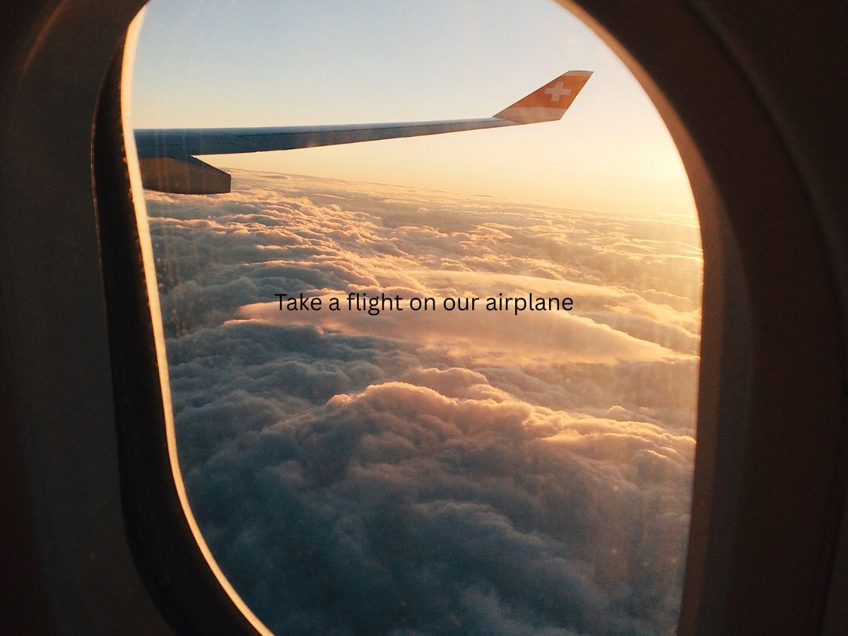 A black and white photo of a camera on a tripod.