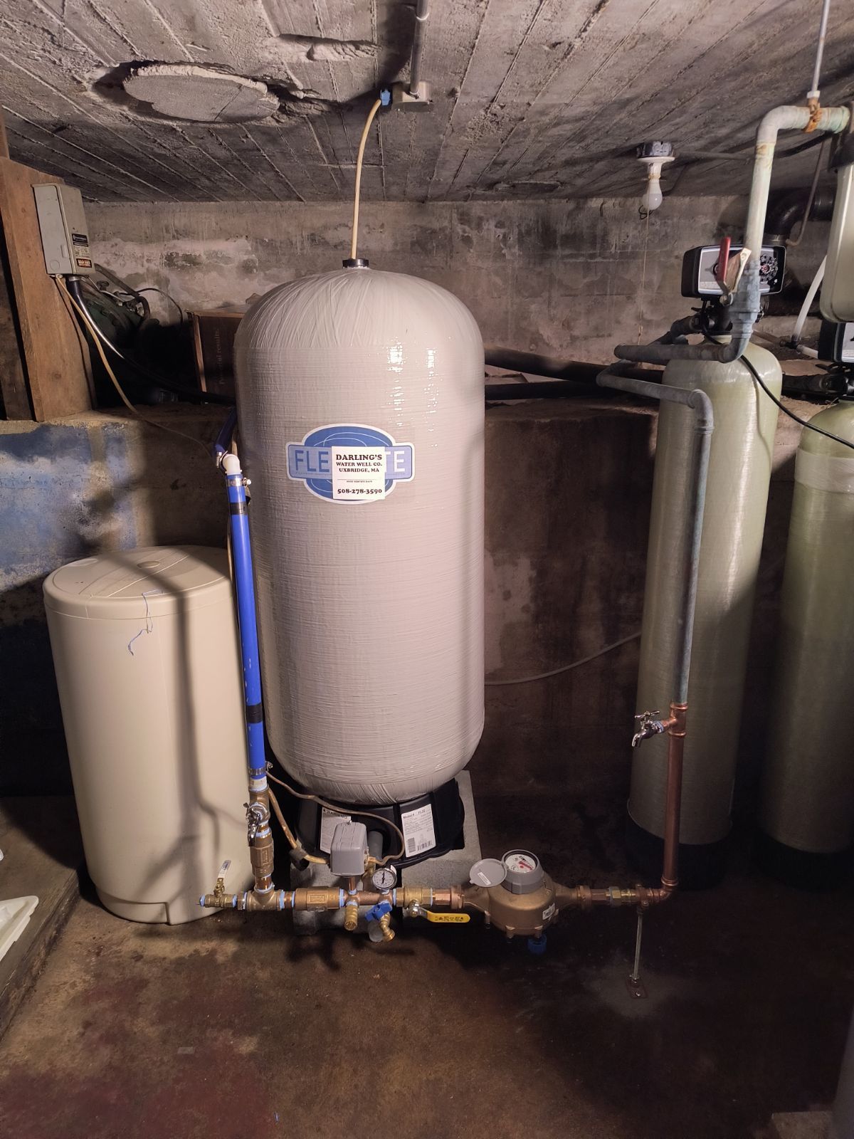 Water Heater in a Basement Next to a Water Tank — Uxbridge, MA — Darling's Water Well Company