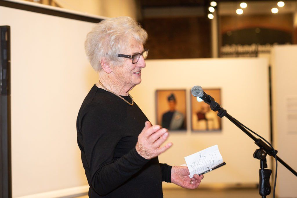 New Zealand artist Piera McArthur proposing a toast to Douglas MacDiarmid at the launch of his biography Colours of a Life, 12 July 2018.