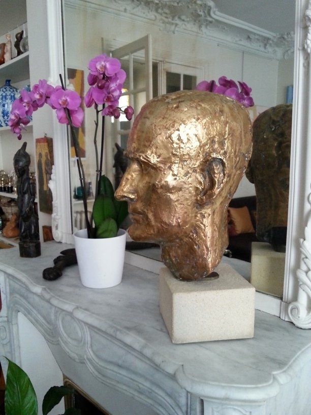 A bronze head of Douglas in his younger days, made by French sculptor Jean Dambrin in 1965, that has graced the mantlepiece of Douglas and Patrick’s living room ever since