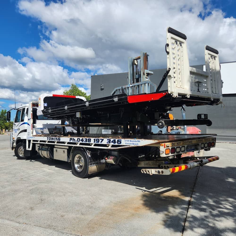 A Tow Truck is Parked on the Side of the Road — Lyle's Towing In Little Mountain, QLD