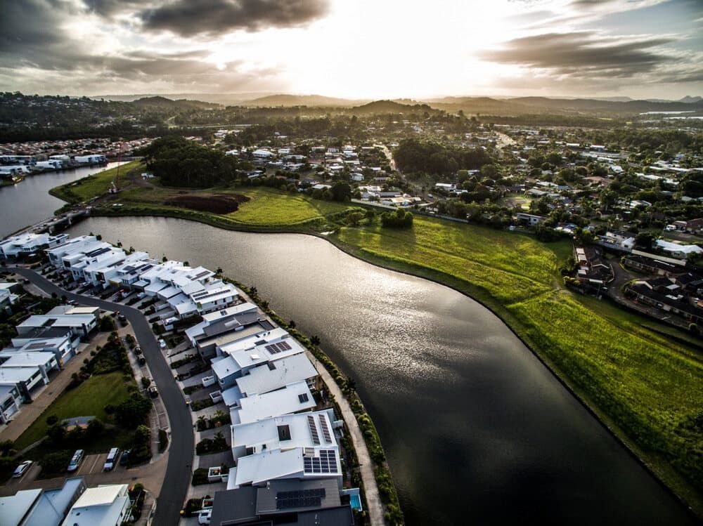 An Aerial View of a City With a Lake in the Middle of It — Lyle's Towing In Maroochydore, QLD
