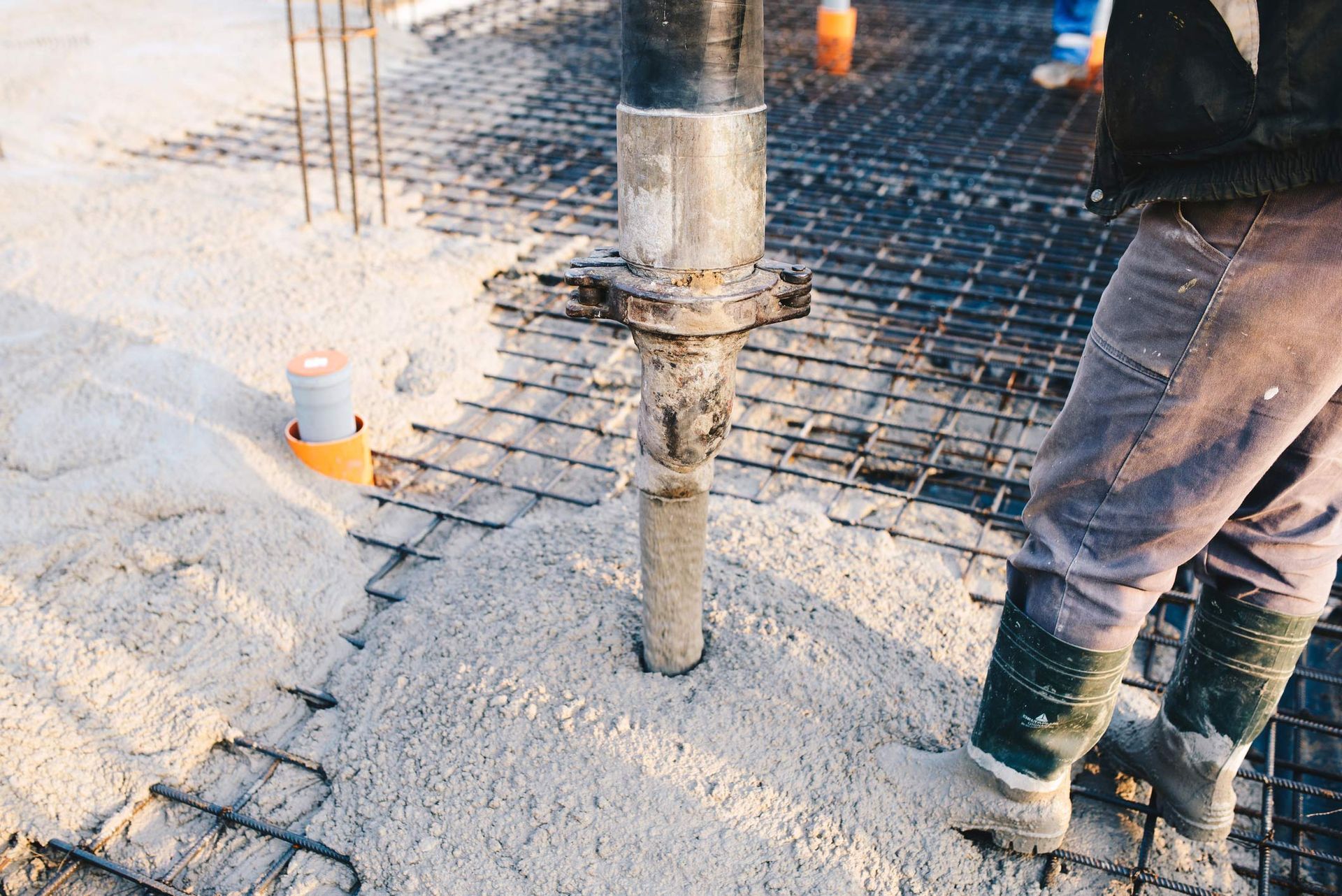 Accurate Foundation Repair specialist performing slab jacking technique in Plano, TX