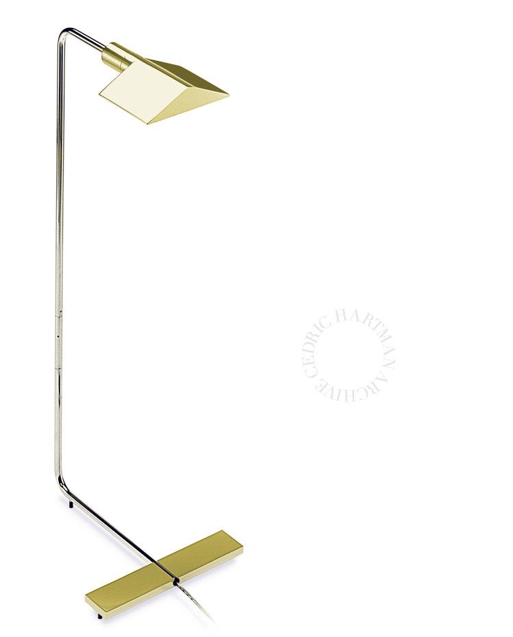 a floor lamp with a yellow shade on a white background .