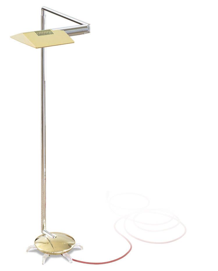 a floor lamp with a triangle shaped shade on a white background .