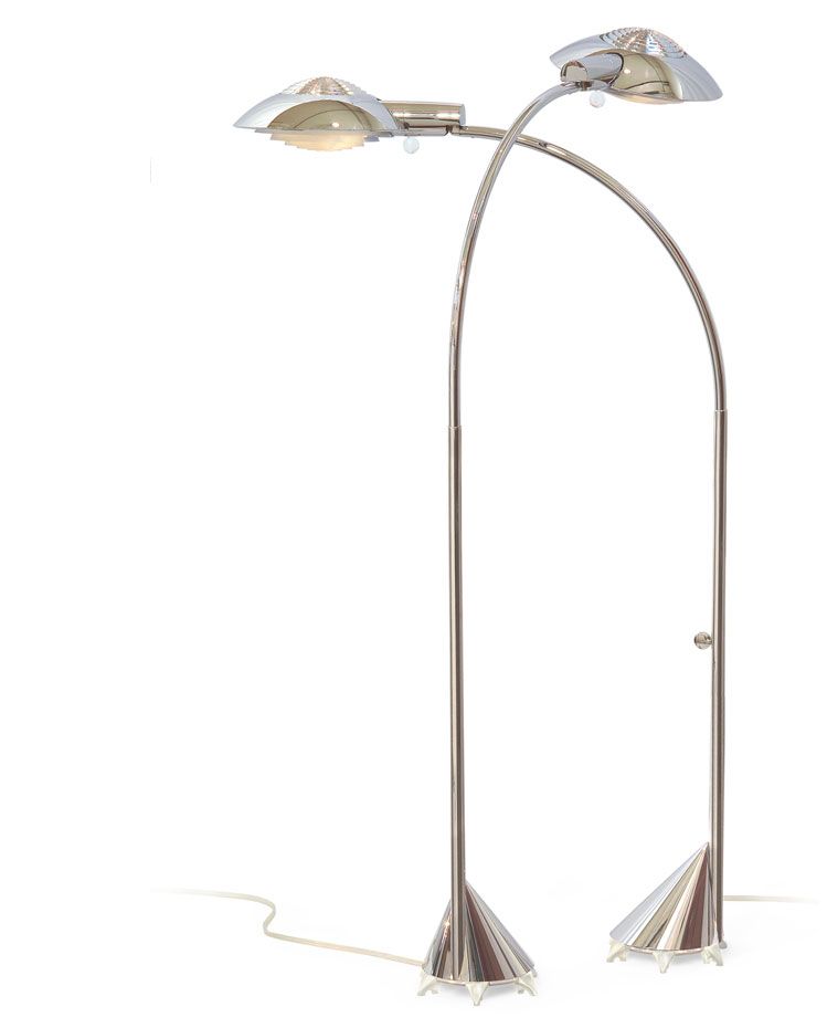 a silver lamp with two lights on a white background