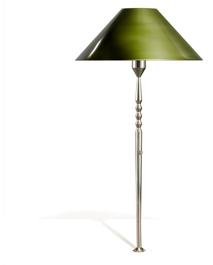 a lamp with a green shade on a white background