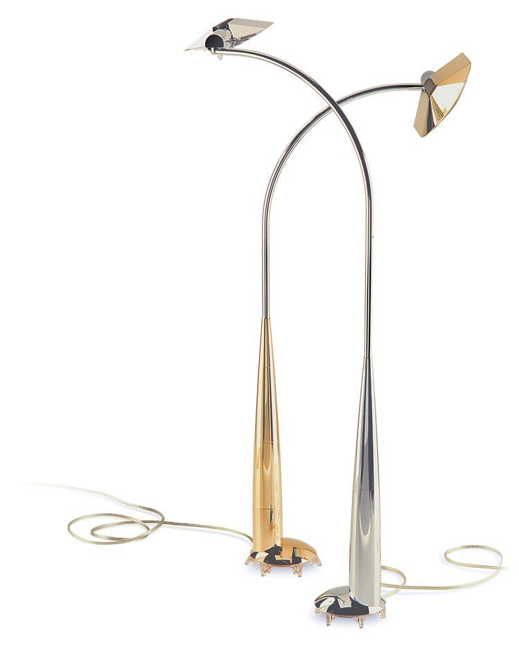 two floor lamps are sitting next to each other on a white background