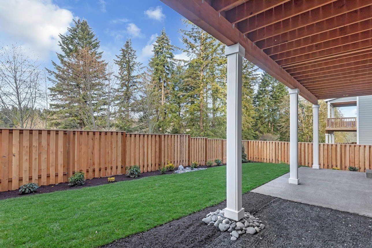 Noyes Homes | New Custom Homes | Beaverton, Oregon | Backyard | Covered Patio