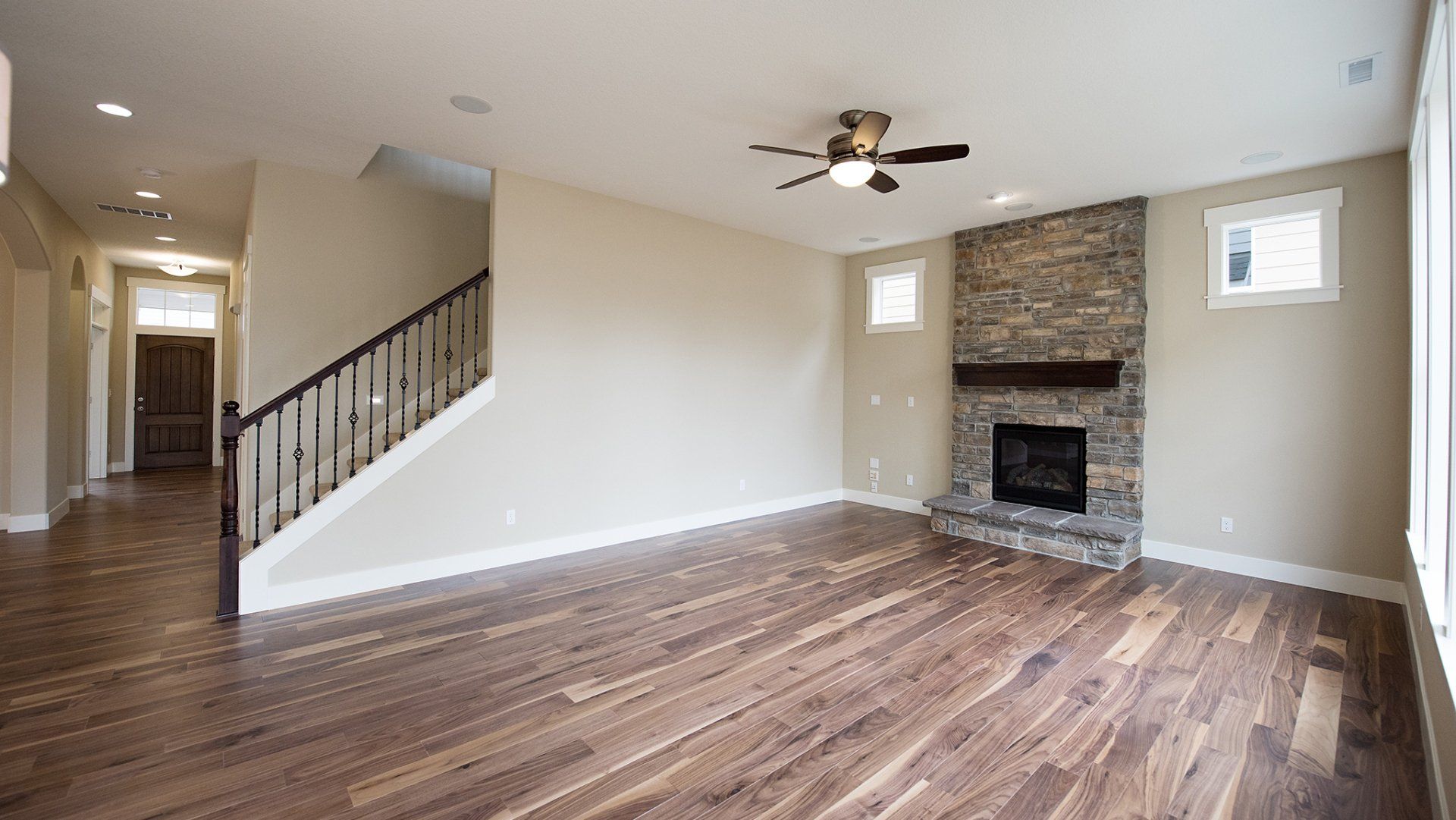 Noyes Homes | New Custom Homes | Beaverton, Oregon | Home interior| Rock Chimeny| Wood floors