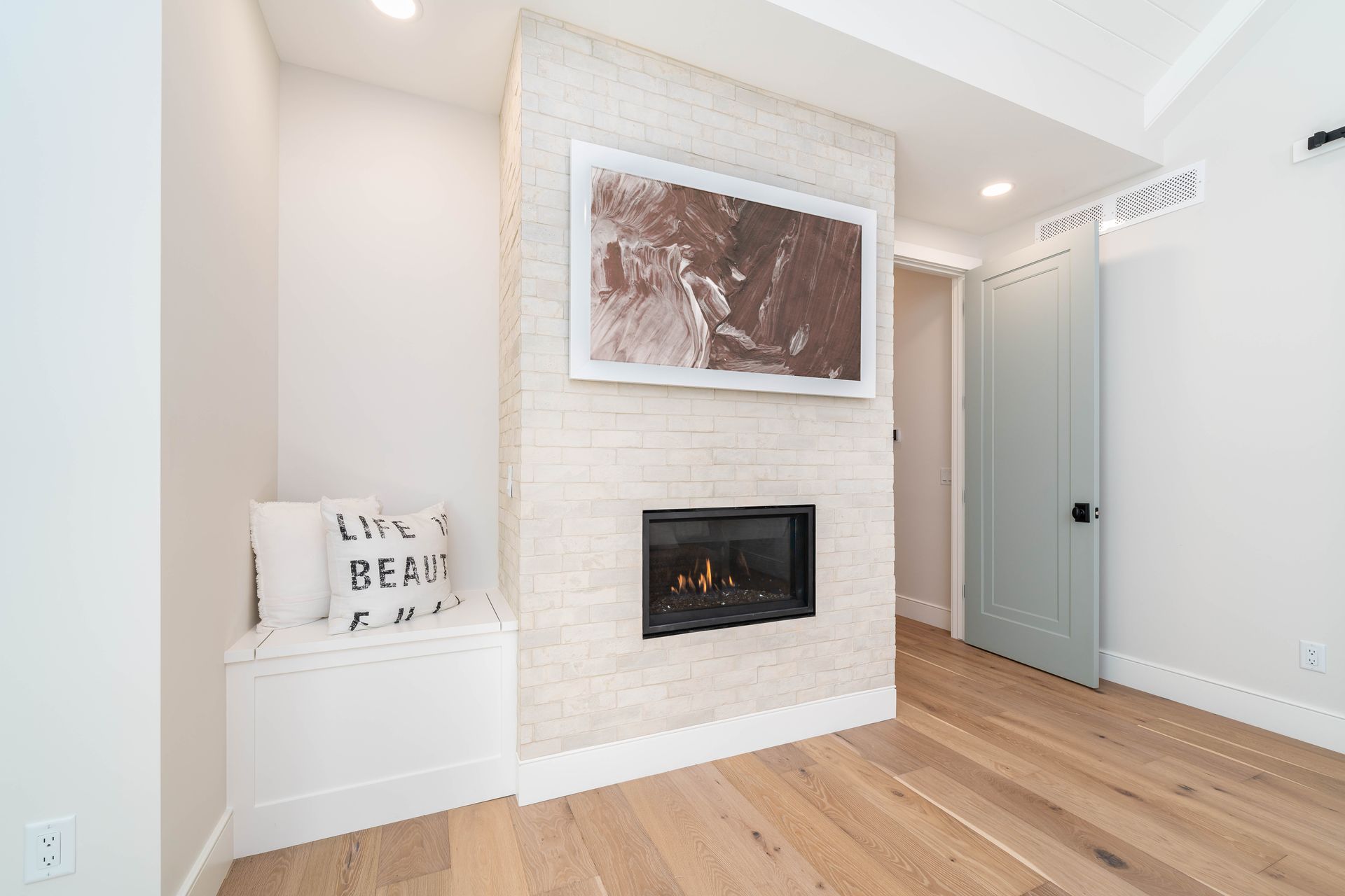 There is a fireplace in the middle of the room.