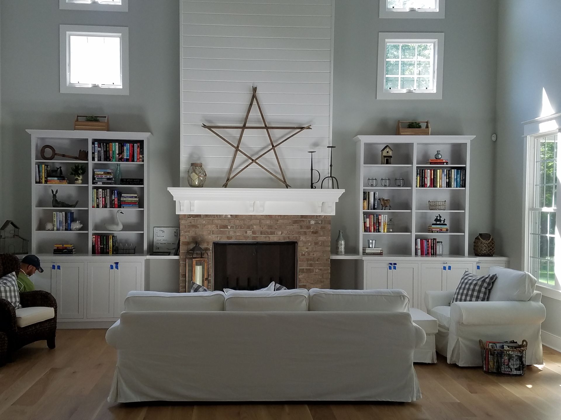 A living room with a fireplace and a couch