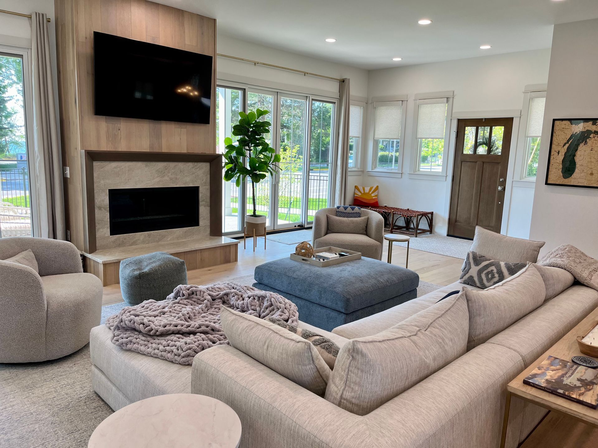 A living room filled with furniture and a fireplace.