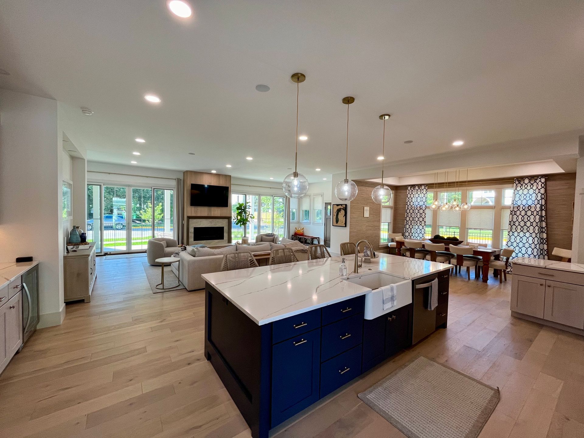 A kitchen with a large island in the middle of the room.