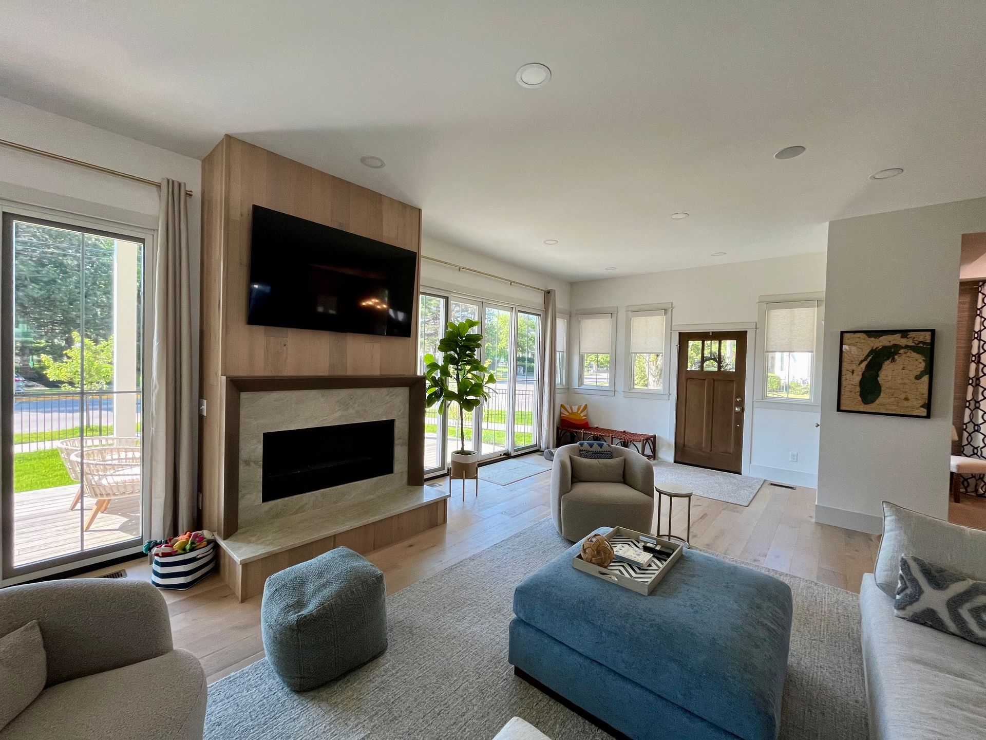 A living room filled with furniture and a fireplace.