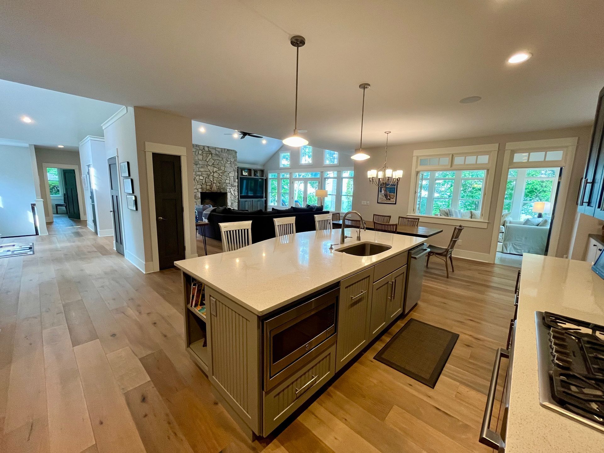 There is a large island in the middle of the kitchen.