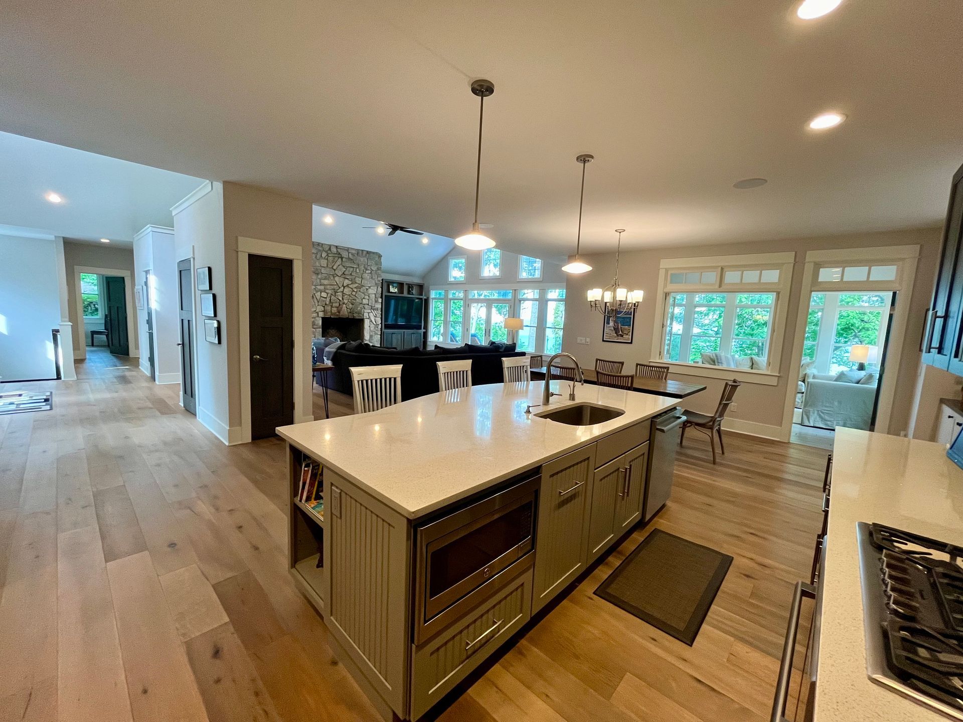 A kitchen with a large island in the middle of the room.