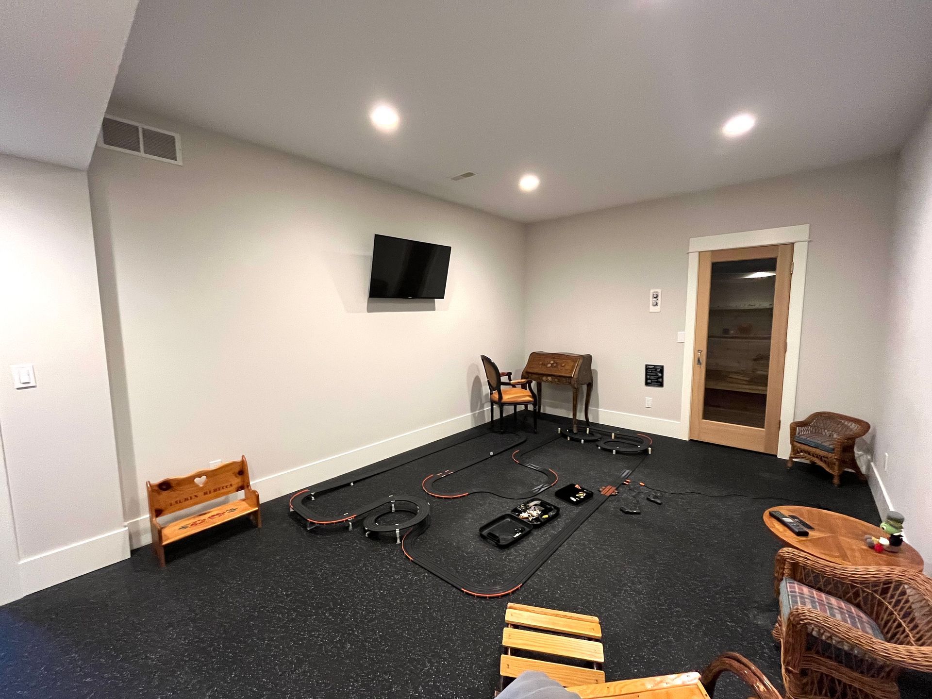 There is a race track in the middle of the room.