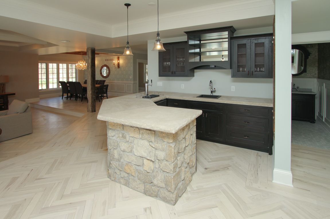 There is a large island in the middle of the kitchen.