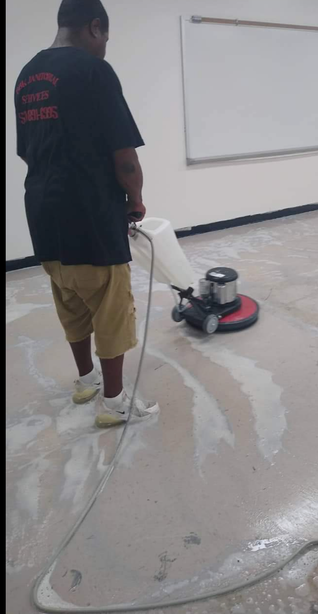 Worker Cleaning the Floor