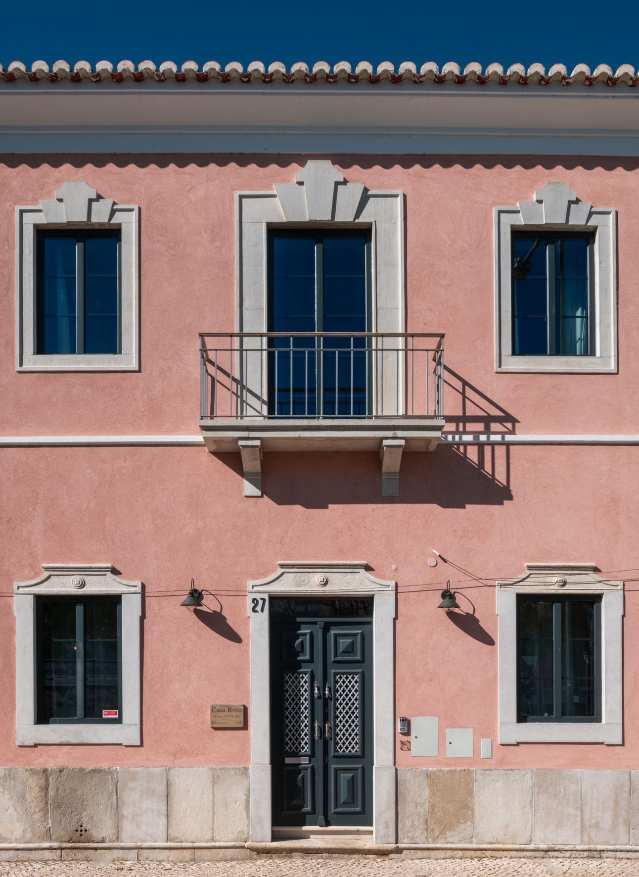 a pink building with the number 31 on it