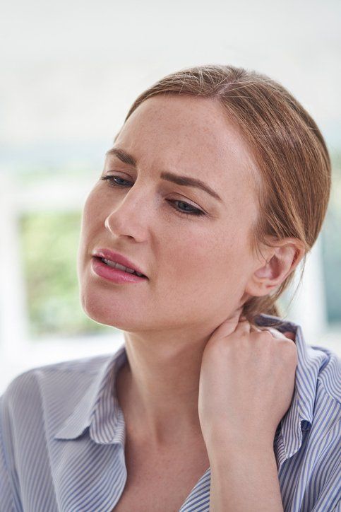 Woman Seeking Neck Pain Relief in The Woodlands & Conroe, TX
