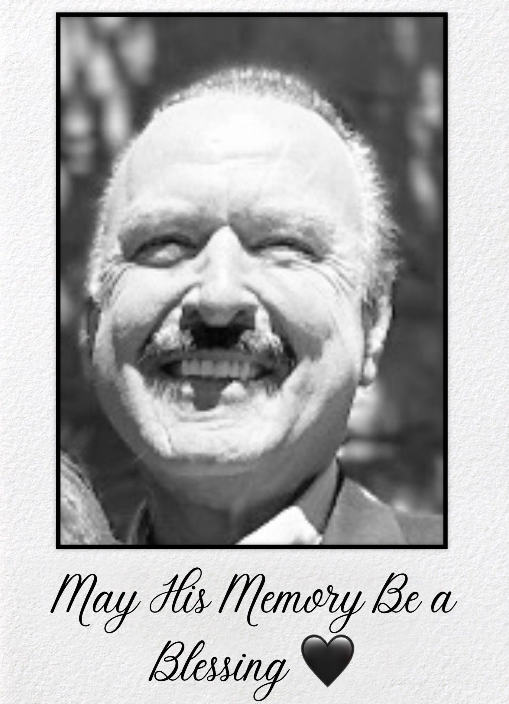 Black and white portrait of a smiling man with a mustache. Text below reads 