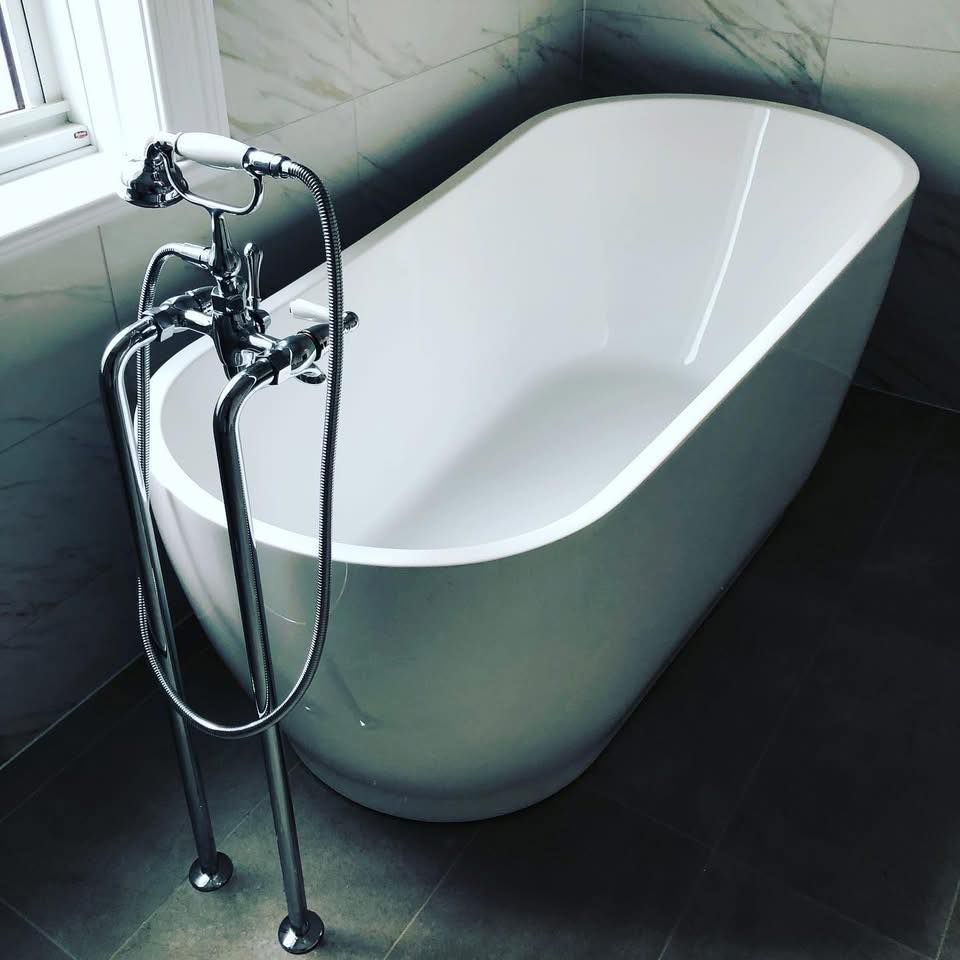 White Freestanding Bathtub in a Bathroom — Oxplumb in Nambour, QLD