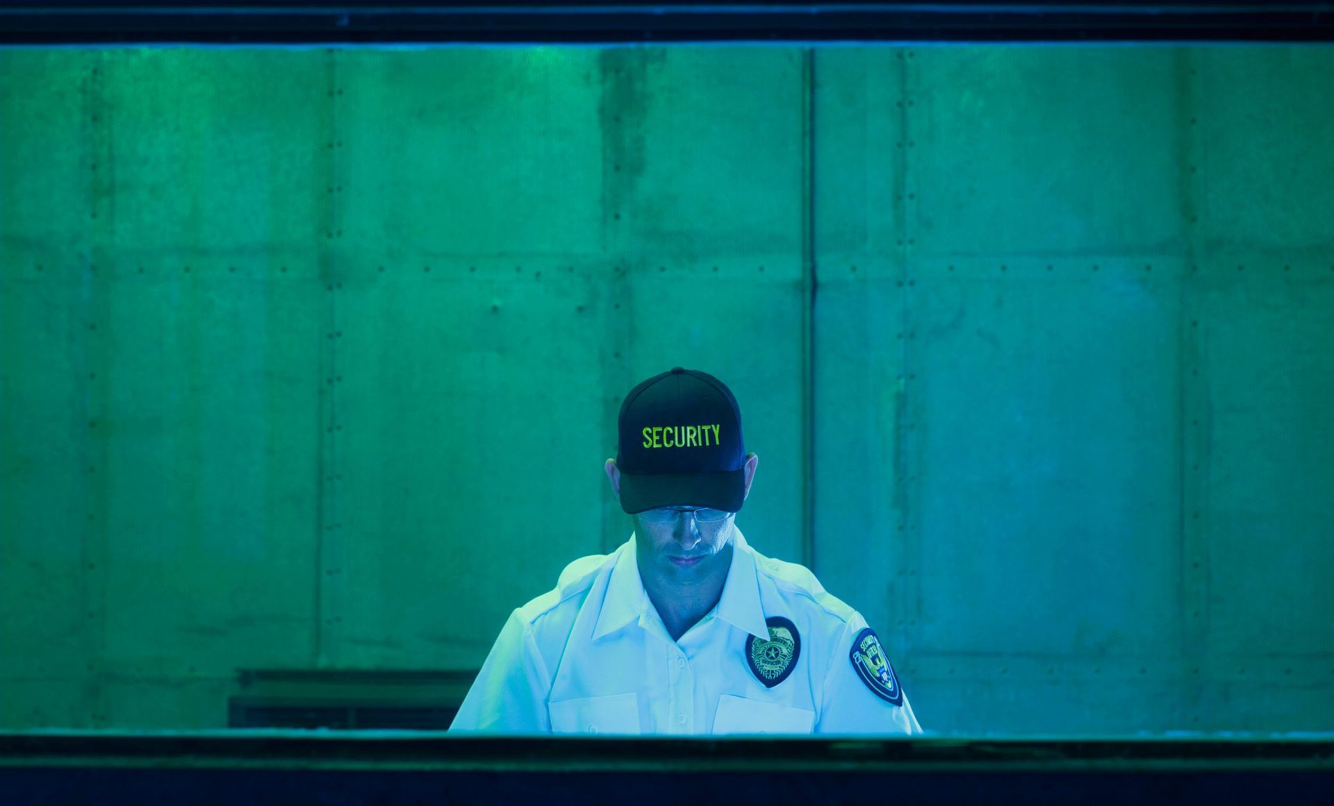 Security Guard Sitting in Control Room — Gold Coast, Qld — Australian Security Company