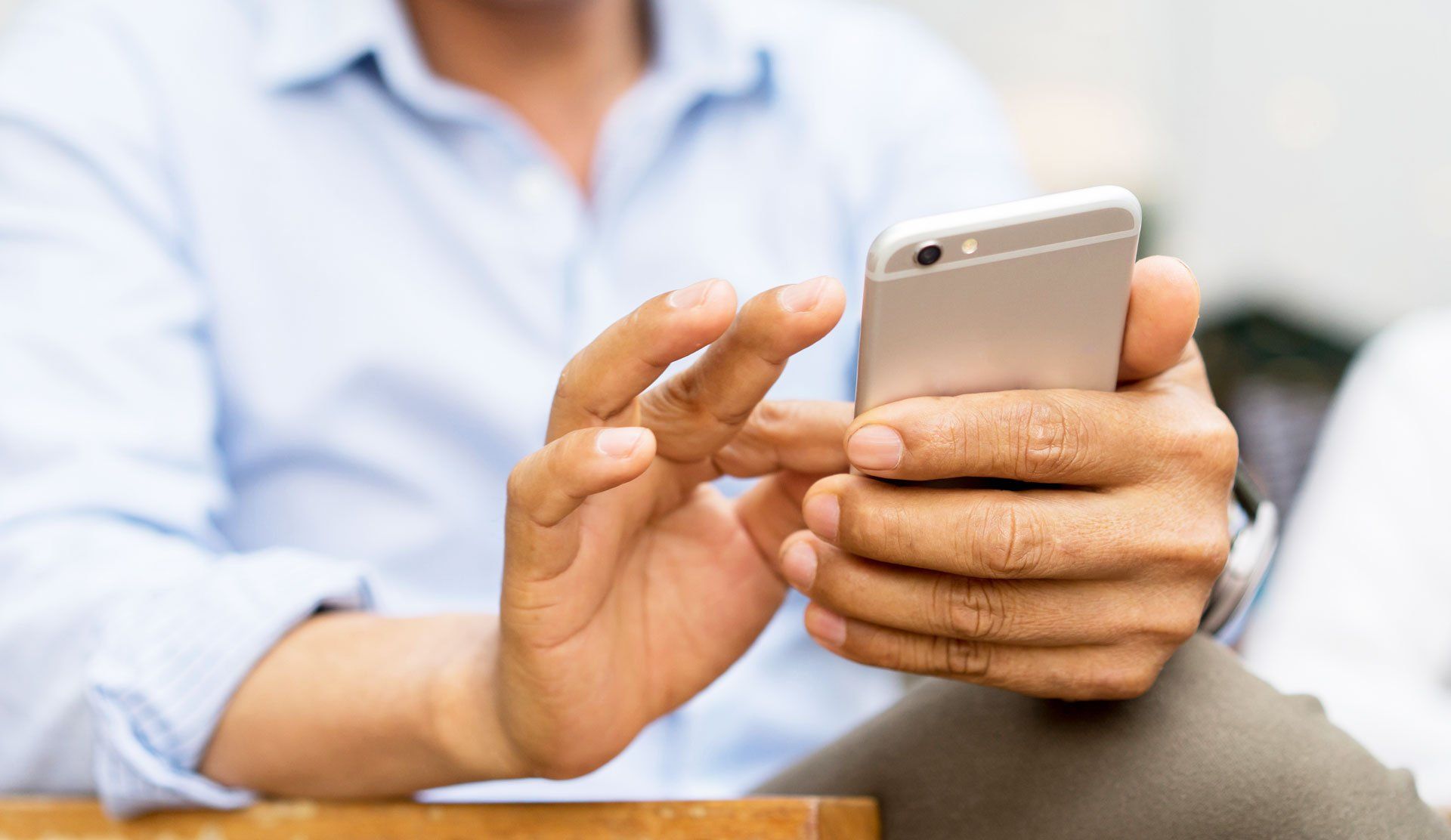 Man Using Phone for Appointment | Billings, MT | Fuller Family Medicine