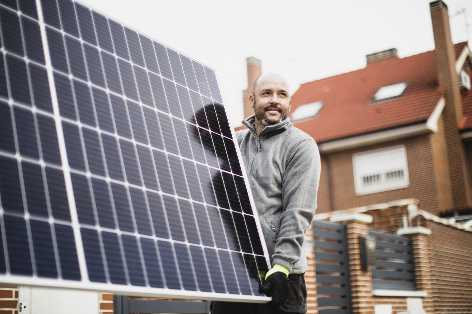 Owner Installing Solar Panel - PYA Insurance Brokerage in Ontario, CA
