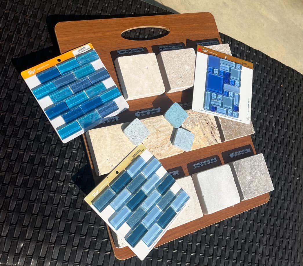 A wooden tray filled with different types of tiles