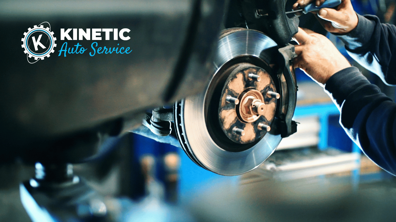 technician performing a brake inspection on a vehicle in regina, saskatchewan