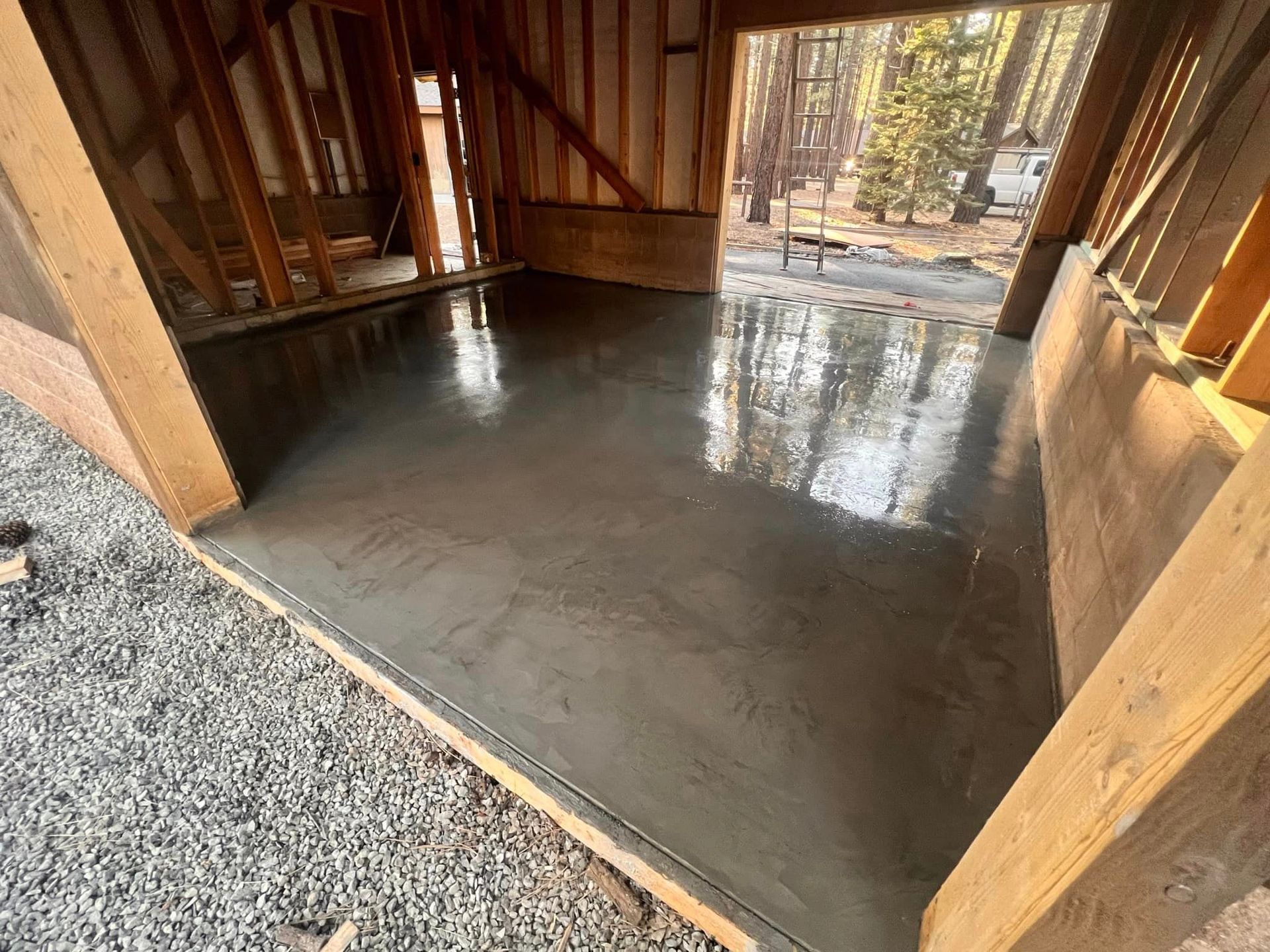 A concrete floor in a building under construction.