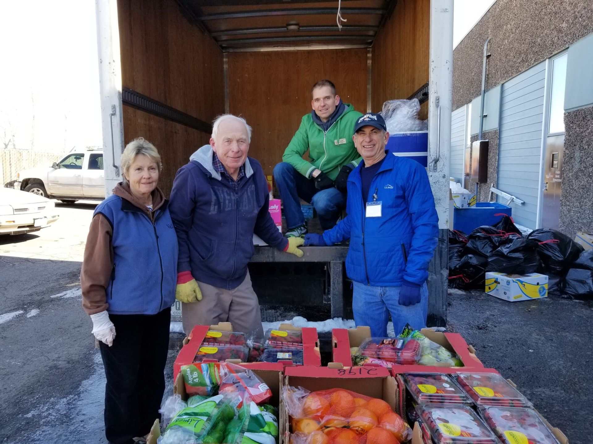 help and hope center volunteers in castle rock unload a truck