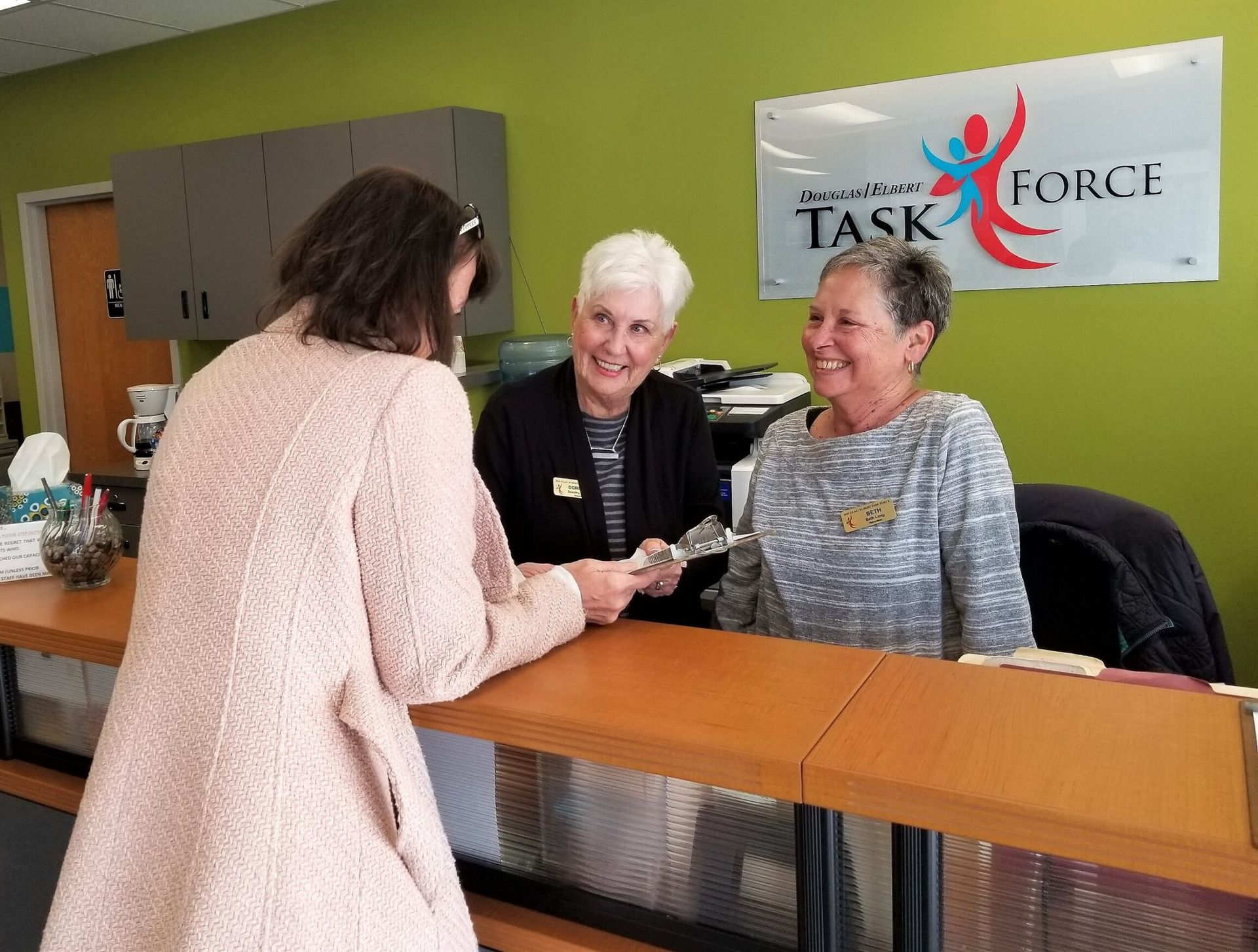 Office volunteers in Castle Rock's help and hope center