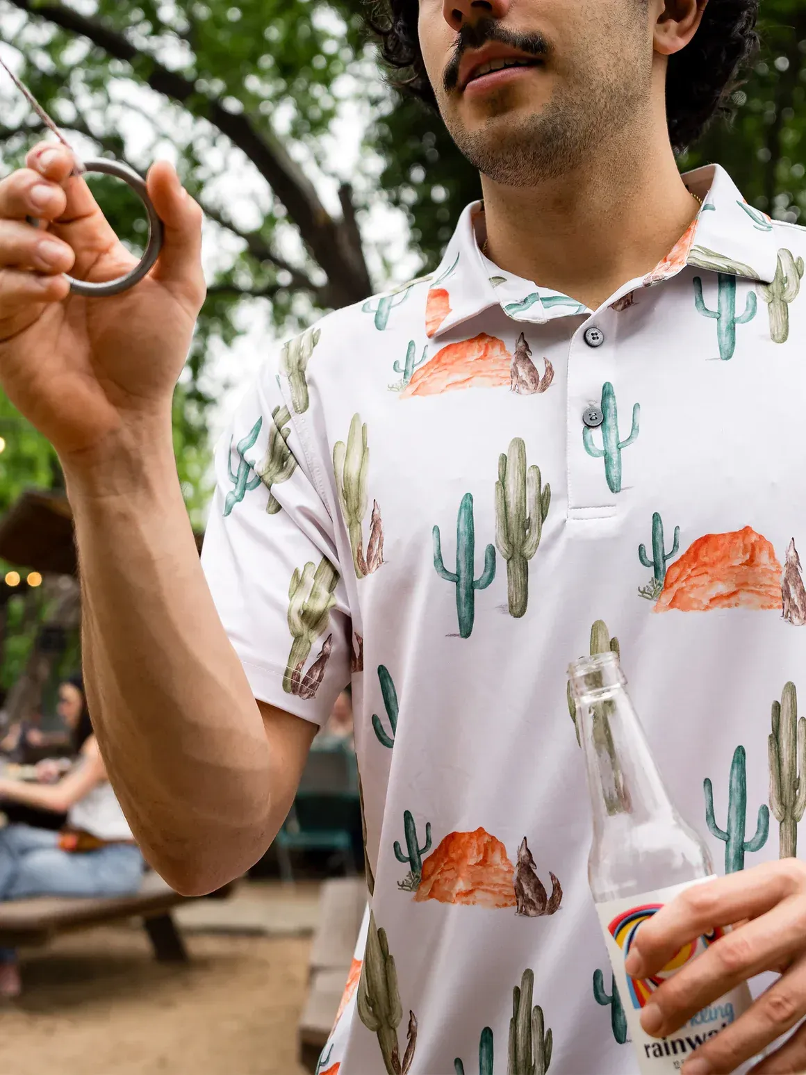 Raised by Coyotes patterned polo shirt