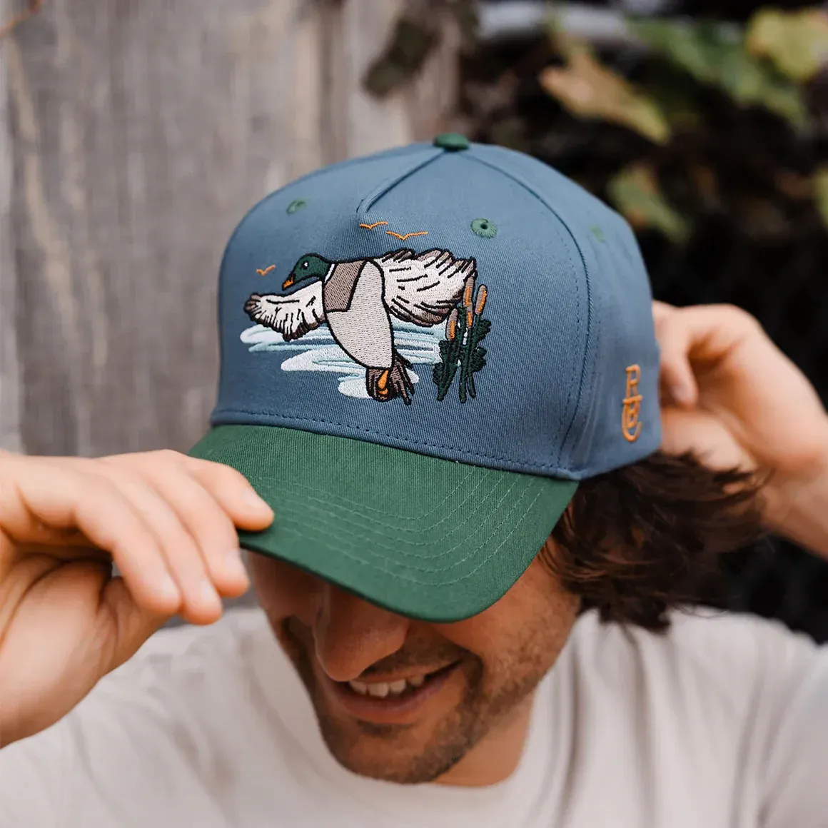 Raised by Coyotes embroidered hat