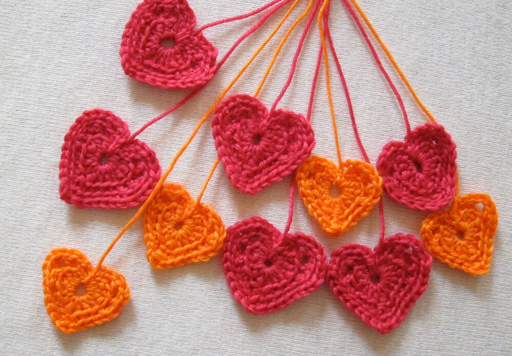 A bunch of knitted heart ornaments