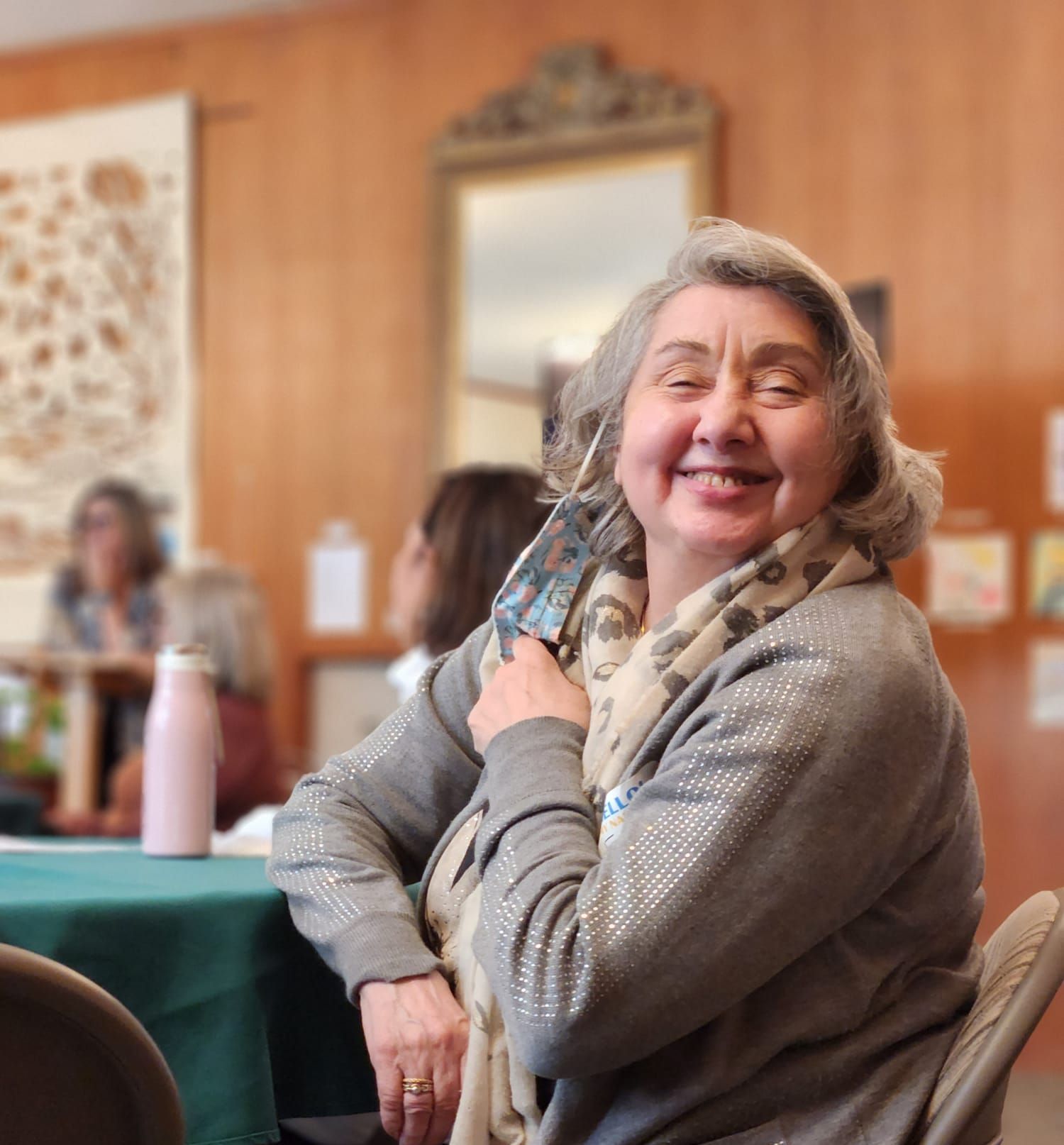 Woman smiling during an event at the Lounge. That woman is Freida!!!