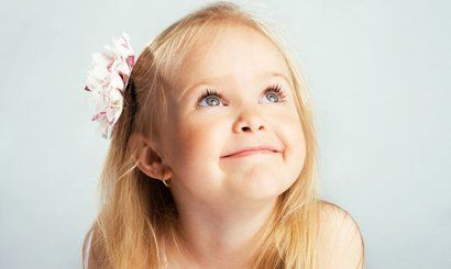 a small girl looking