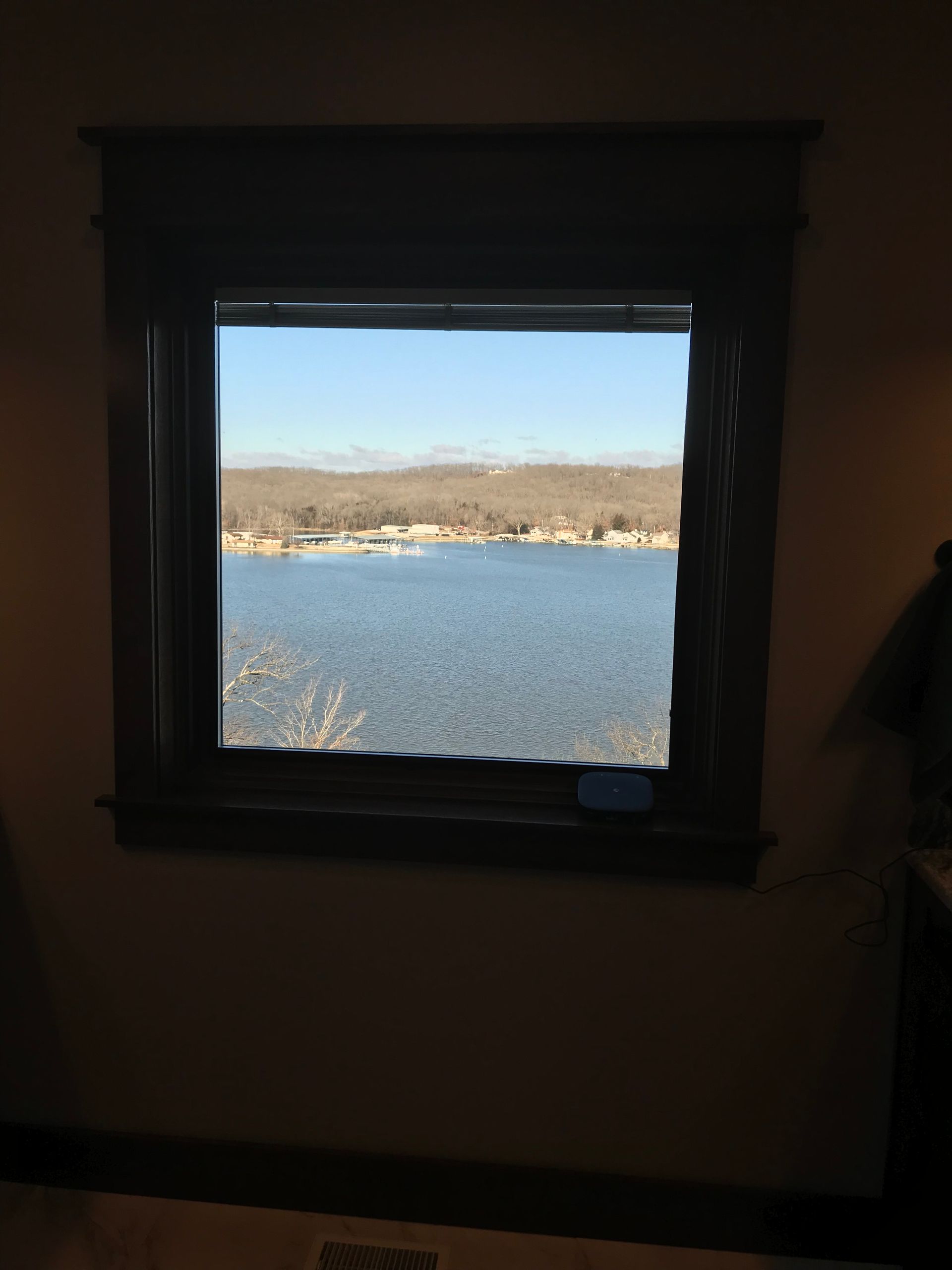 A window with a view of a body of water