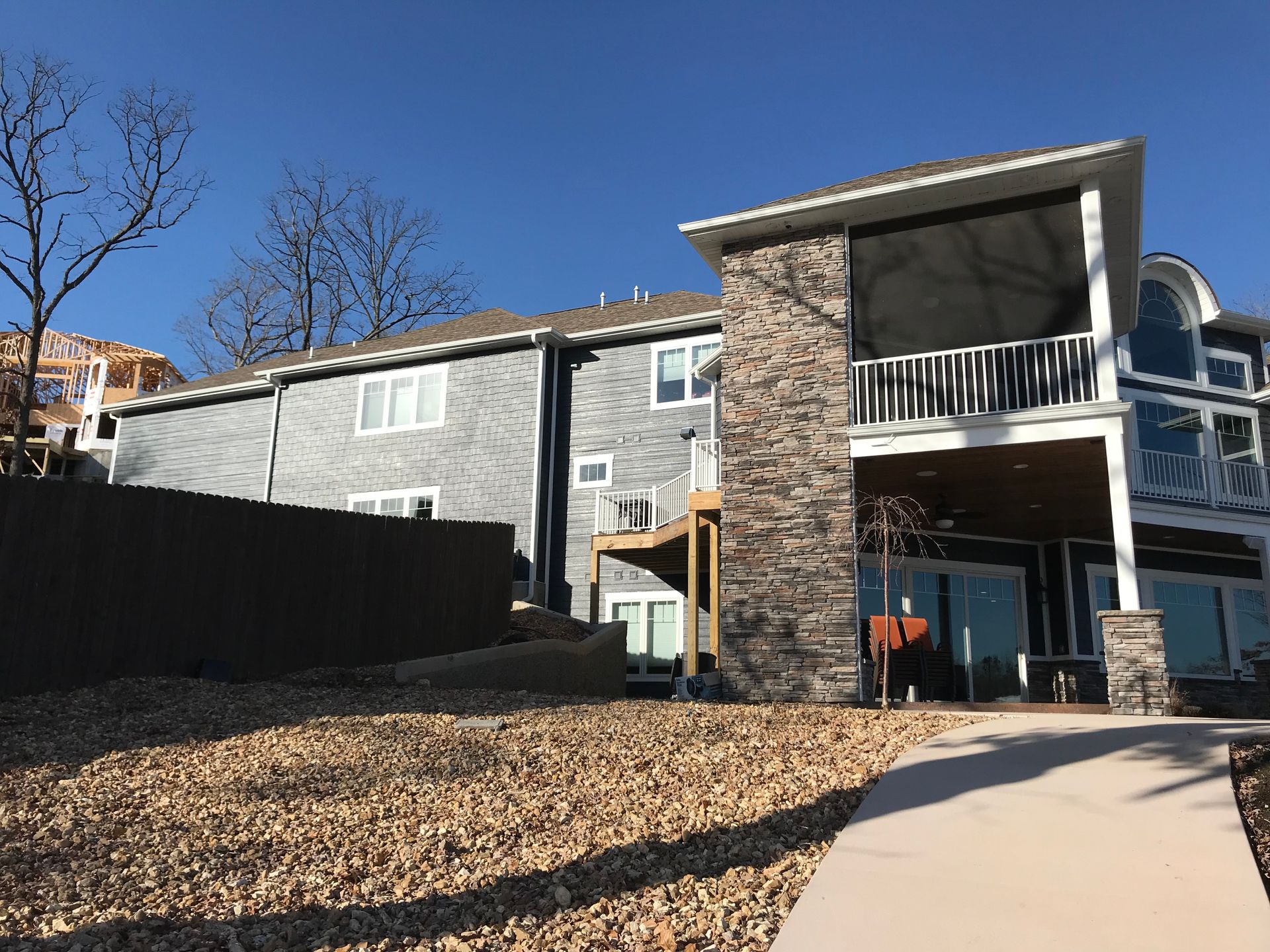 A large house with a walkway leading to it