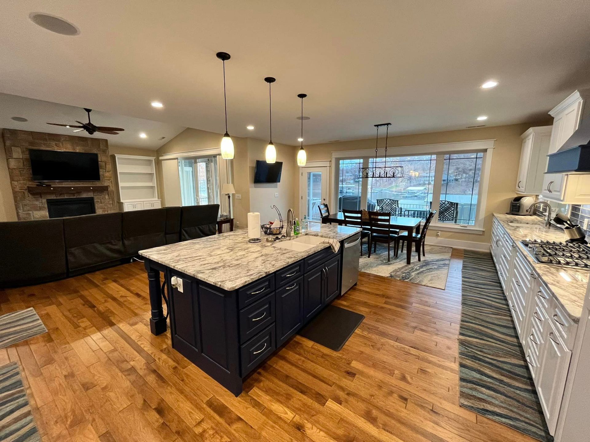 A kitchen with a large island in the middle of the room.