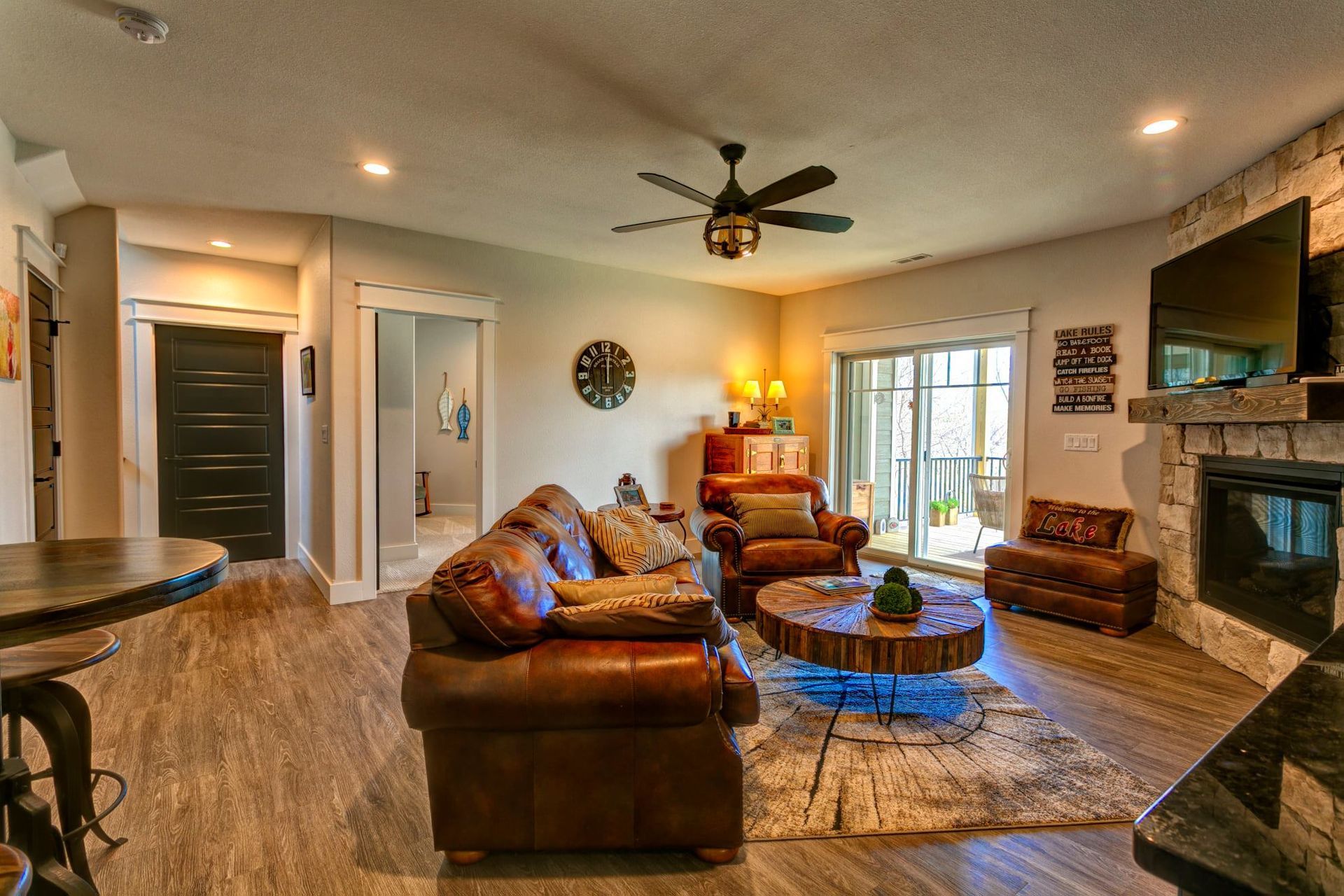 A living room filled with furniture and a fireplace.
