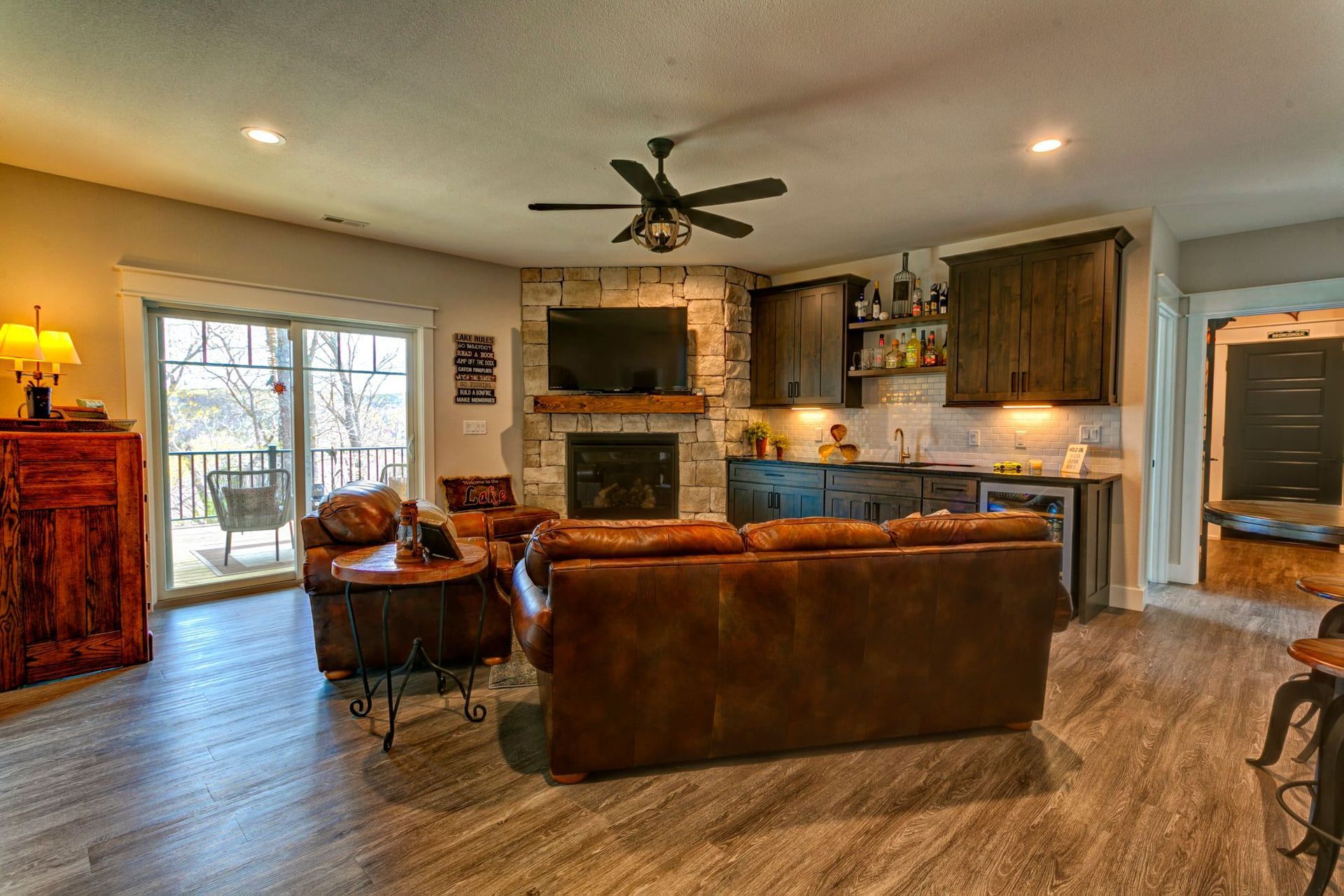 A living room filled with furniture and a fireplace.